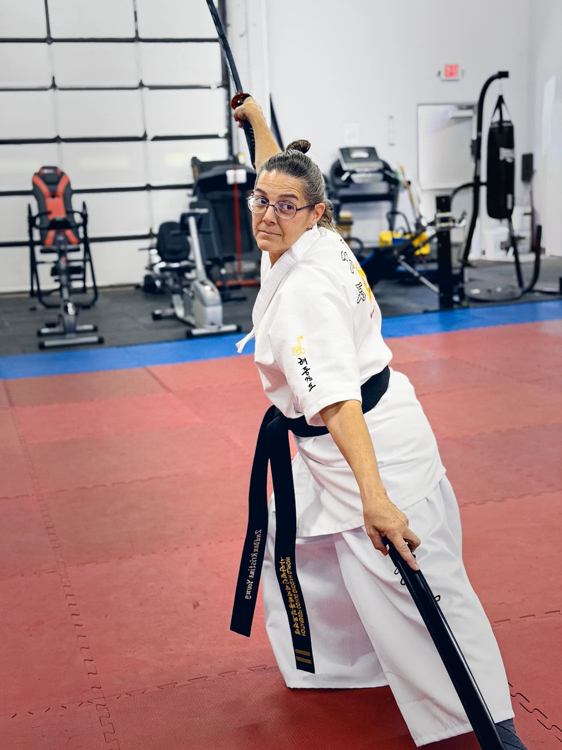 Female instructor demonstrating katana work